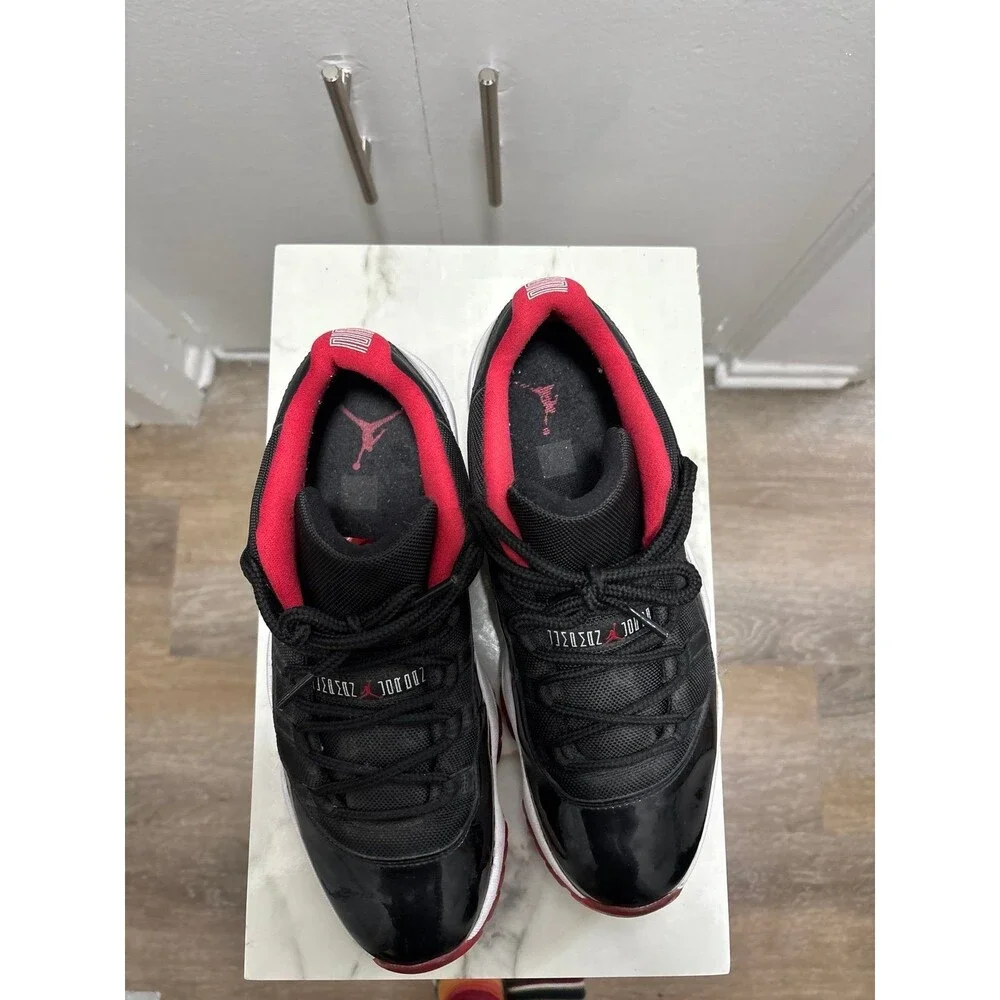 Air Jordan 11 Retro Low Bred Mens Size 11 Black True Red Patent Leather